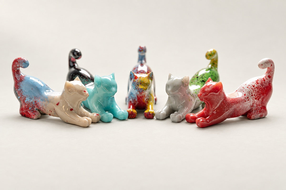 A small batch of five cat prints with different painted finishes